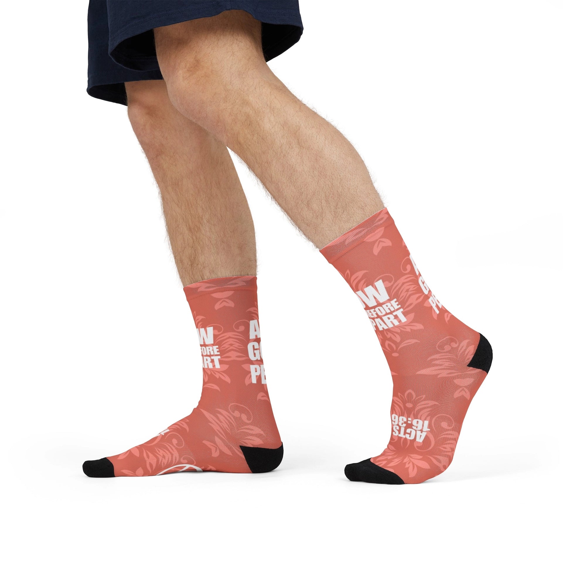 Man wearing Go in Peace bible socks