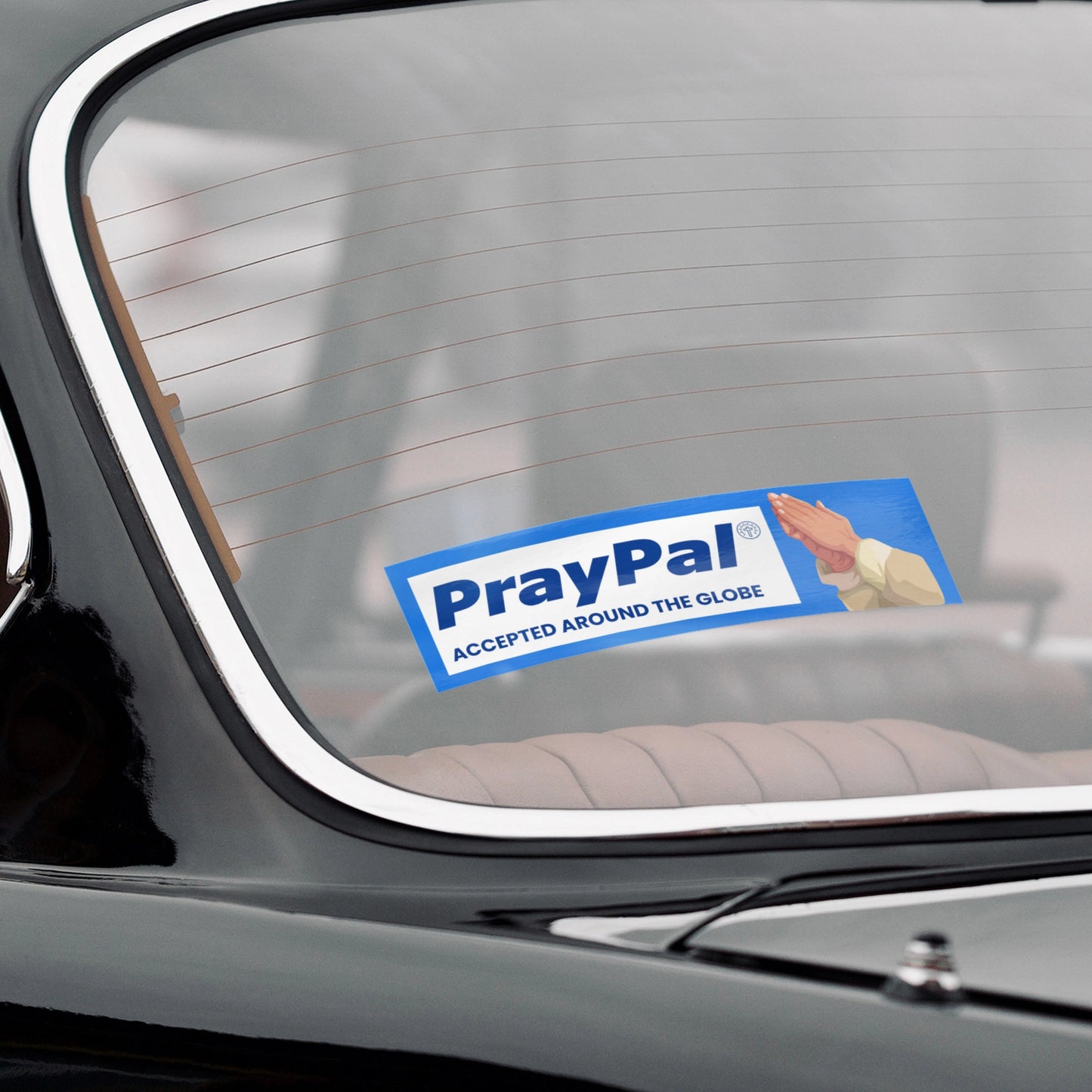 Funny Christian PrayPal bumper sticker on car windshield