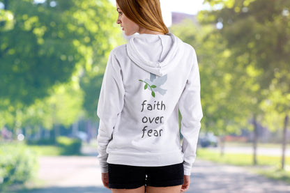 Girl wearing Faith Over Fear hoodie